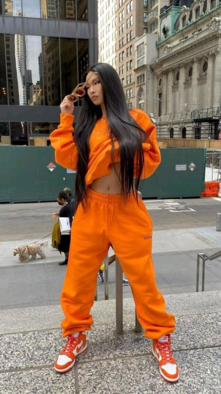 Vibrant Orange Tracksuit with Orange Jordans